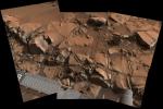 This view from NASA's Curiosity Mars rover shows a swath of bedrock called 'Alexander Hills,' which the rover approached for close-up inspection of selected targets. It is a mosaic of six frames taken on Nov. 23, 2014.