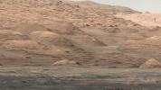 This view from the Mastcam on NASA's Curiosity Mars rover shows dramatic buttes and layers on the lower flank of Mount Sharp. It was taken on Sept. 7, 2013, from near the waypoint called 'Darwin' on the route toward an entry point to the mountain.