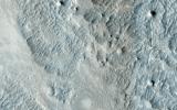 This image from NASA's Mars Reconnaissance Orbiter, approximately 1.5 x 3 kilometers, shows a sample of eroded Martian terrain in Arabia Terra.