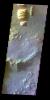 The THEMIS VIS camera contains 5 filters. The data from different filters can be combined in multiple ways to create a false color image. This false color image from NASA's 2001 Mars Odyssey spacecraft shows part of Ganges Chasma.