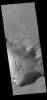This image from NASA's 2001 Mars Odyssey spacecraft shows Asimov Crater is unique in that the crater floor has been completely filled with material to approximately the crater rim and then a series depressions have occurred near the crater rim.