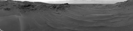 NASA's Curiosity Mars rover used its Navigation Camera (Navcam) to capture this scene toward the west just after completing a drive that took the mission's total driving distance past 10 kilometers (6.214 miles).