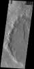 This image from NASA's 2001 Mars Odyssey spacecraft shows numerous gullies dissect the rim of this unnamed crater in Terra Sirenum.
