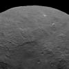 NASA's Dawn spacecraft took this image on June 6, 2015, which includes an intriguing pyramid-shaped mountain protruding from a relatively smooth area in the upper right. 