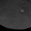 A cluster of mysterious bright spots on dwarf planet Ceres can be seen in this image, taken by NASA's Dawn spacecraft on June 9, 2015.