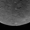 This image of Ceres, taken by NASA's Dawn spacecraft, features several craters with bright material within and around them. The image is centered on terrain near the equator of Ceres and faces southeast.