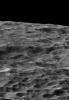 NASA's Cassini spacecraft gazes out upon a rolling, cratered landscape in this oblique view of Saturn's moon Dione. A record of impacts large and small is preserved in the moon's ancient, icy surface.