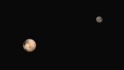 These two images of Pluto and Charon were collected separately by NASA's New Horizons during approach on July 13 and July 14, 2015. The relative reflectivity, size, separation, and orientations, and colors are approximated in this composite image.