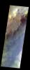 The THEMIS VIS camera contains 5 filters. The data from different filters can be combined in multiple many ways to create a false color image. This image from NASA's 2001 Mars Odyssey spacecraft shows dunes of the floor of Keeler Crater in Terra Sirenum.