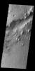 The linear depression in this image from NASA's 2001 Mars Odyssey spacecraft is part of Nili Fossae.