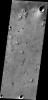 This image captured by NASA's 2001 Mars Odyssey spacecraft shows a small portion of Acidalia Planitia, a largely flat plain that is part of Mars' vast northern lowlands.