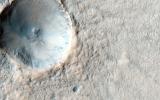 A pedestal crater is when the ejecta from an impact settles around the new crater and is more erosion-resistant than the surrounding terrain as seen in this image from NASA's Mars Reconnaissance Orbiter.