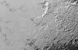 Ice (probably frozen nitrogen) that appears to have accumulated on the uplands on the right side of this image from NASA's New Horizons, is draining from Pluto's mountains onto the informally named Sputnik Planum.