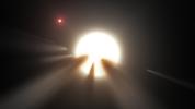 Using data from NASA's Kepler and Spitzer Space Telescopes, this artist's concept shows a star behind a shattered comet.