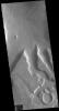 This image captured by NASA's 2001 Mars Odyssey spacecraft shows part of a complex region of channels which dissect the margin of Arabia Terra where elevations lower into Acidalia Planitia.