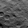 Part of the southern hemisphere on dwarf planet Ceres is seen in this image taken by NASA's Dawn spacecraft. Two prominent, similarly sized craters (at left) demonstrate how impact features become degraded over time.