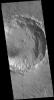 This image from NASA's 2001 Mars Odyssey spacecraft shows an unnamed crater in Chryse Planitia. There are several concentric ridges visible on the right side of this image.