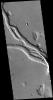 This image captured by NASA's 2001 Mars Odyssey spacecraft shows a portion of Hebrus Valles. This channel system was formed by liquid flow of either water or lava, or a combination of both.