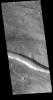 The linear feature in this image from NASA's 2001 Mars Odyssey spacecraft is part of Granicus Valles. The linear nature, and uniform width is indicative of a fault bounded graben.