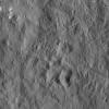 Flecks of bright material can be seen in this image of Ceres, taken by NASA's Dawn spacecraft. Dawn took this image on Dec. 19, 2015, at an approximate altitude of 240 miles (385 kilometers) above Ceres.