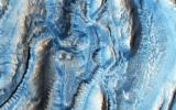 This image was taken by NASA's Mars Reconnaissance Orbiter spacecraft, in one of the regions on Mars well-known for its viscous flow features (VFF), which are massive flowing deposits believed to be composed of a mixture of ice and dust.