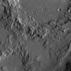 This image, taken by NASA's Dawn spacecraft, shows the rim of Ikapati Crater on Ceres. The rough features around the rim of this impact scar give way to smoother, lightly cratered terrain in the lower half of the image.