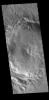 This unnamed crater in Amazonis Planitia has a complex rim. The bottom portion of this image from NASA's 2001 Mars Odyssey spacecraft shows several parallel rims, while the rim at the top of the image is lobate but not quite round.