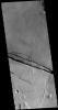 This image captured by NASA's 2001 Mars Odyssey spacecraft shows Cerberus Fossae, a group of graben located near the southern part of Tartarus Montes.