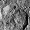 Ninsar Crater, in the northern hemisphere of Ceres, is seen this view from NASA's Dawn spacecraft. Ninsar was named for a Sumerian goddess of plants and vegetation.