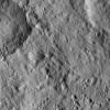 This view from NASA's Dawn spacecraft shows a portion of Ertedank Planum, a large, generally flat area in the northern hemisphere of Ceres. Ejecta from a nearby impact has smoothed older features in this scene.