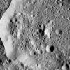 Ernutet Crater is featured in this image from Ceres, taken by NASA's Dawn spacecraft. Ernutet was named for the Egyptian cobra-headed goddess of the harvest. The crater measures about 32 miles (52 kilometers) in diameter and is located in the northern hem