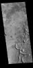 This image captured by NASA's 2001 Mars Odyssey spacecraft shows a small portion of Yuty Crater's ejecta blanket.