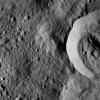 This view from NASA's Dawn spacecraft features the sharp rim of a steep-walled crater on Ceres.
