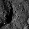 This image captured by NASA's Dawn spacecraft features the shadowy rim of an unnamed crater on Ceres. The crater on the left appears relatively old, as its flanks are rugged and the crater density inside it is more or less uniform.