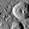 This image captured by NASA Dawn spacecraft shows small craters within Meanderi Crater on Ceres, which measures 64 miles 103 kilometers in diameter.