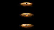 This artist's impression depicts the accretion disc surrounding a black hole, in which the inner region of the disc precesses. 'Precession' means that the orbit of material surrounding the black hole changes orientation around the central object.