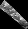 Hundreds of sand dunes are visible as dark lines snaking across the surface of Titan as seen by NASA's Cassini spacecraft's Radar Mapper.