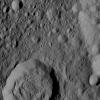 Liber Crater is featured at lower left in this image from Ceres. Named for the Roman god of agriculture, Liber is 14 miles (23 kilometers). NASA's Dawn spacecraft took this image on June 16, 2016.