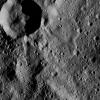This view from NASA's Dawn spacecraft shows terrain in the southern hemisphere of Ceres. Most of the image is the impact crater named Annona (37 miles, 60 kilometers across); the smaller, prominent crater at upper left is unnamed.