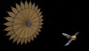 This artist's rendering shows the proposed starshade flying in sync with a space telescope. The giant sunflower-like structure would be used to acquire images of Earth-like rocky planets around nearby stars.