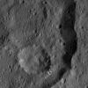 This view from NASA's Dawn spacecraft, taken on May 29, 206, shows part of the floor and eastern rim on Consus Crater (40 miles or 64 kilometers wide) on Ceres.