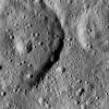 NASA's Dawn took this image on June 17, 2016, of Tibong Crater (22 miles, 36 kilometers wide), at left, on Ceres.