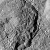 This image from NASA's Dawn spacecraft shows Kondos Crater on Ceres. Dawn took this image on June 10, 2016, from its low-altitude mapping orbit, at a distance of about 240 miles (385 kilometers) above the surface.
