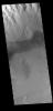 This image captured by NASA's 2001 Mars Odyssey spacecraft shows sand dune forms in Juventae Chasma.