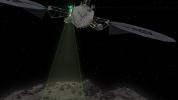 This graphic depicts the Asteroid Redirect Vehicle conducting a flyby of its target asteroid. The robotic segment of the Asteroid Redirect Mission will demonstrate advanced, high-power, high-throughput solar electric propulsion.