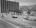 The Administration Building of NASA's Jet Propulsion Laboratory (Building 180) is pictured in this archival image taken in January 1965. What appears as a parking lot in this photograph later becomes 'The Mall,' a landscaped open-air gathering place.