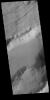 This image captured by NASA's 2001 Mars Odyssey spacecraft shows part of Sirenum Fossae, a large graben on the margin between Terra Sirenum and Daedalis Planum.