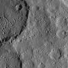 Part of Ezinu Crater on Ceres is seen at top left in this image from NASA's Dawn spacecraft taken on Oct. 20, 2016. The crater features a network of canyon-like features.