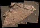 The network of cracks in this Martian rock slab called 'Old Soaker' may have formed from the drying of a mud layer more than 3 billion years ago. The view combines three images taken by NASA's Curiosity Mars rover on Dec. 31, 2016.