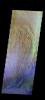 The THEMIS camera contains 5 filters. The data from different filters can be combined in multiple ways to create a false color image. This image from NASA's 2001 Mars Odyssey spacecraft shows part of the interior deposits and floor of Firsoff Crater.